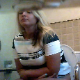 A hidden camera records 5 women using a public restroom. There appears to be several shitting scenes, but muffled audio does not reveal any plops. The first girl cuts an audible fart before wiping. Presented in 720P HD. About 9 minutes.